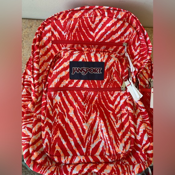 Jansport Backpack in Red, Orange and White Animal like print - Picture 9 of 10